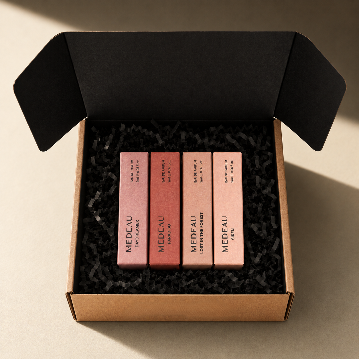 The Medeau Discovery Set box open, showing four 2ml eau de parfum vials